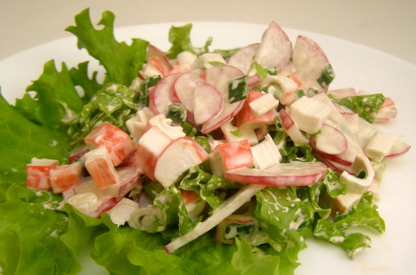 Salad with crab sticks and radish