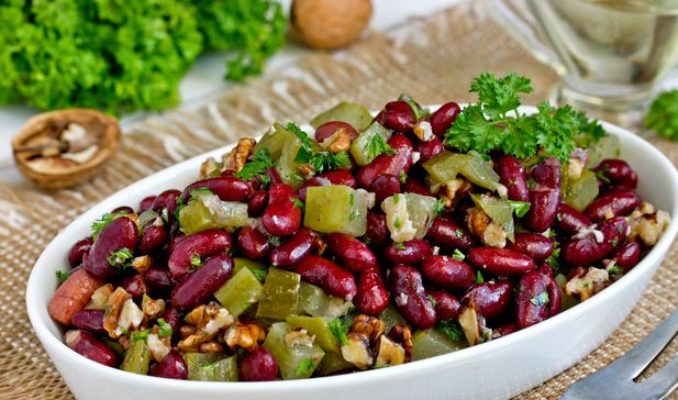 Salad with beans, pickled cucumbers and walnuts