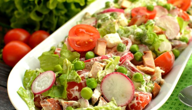 Salad with smoked chicken, radish, feta cheese and tomatoes