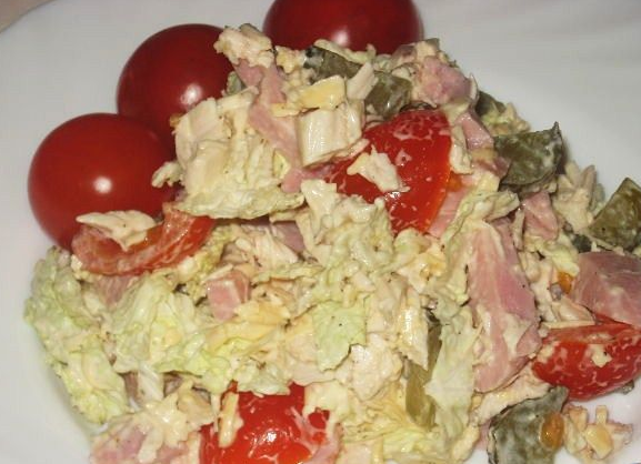 Meat salad with vegetables and cheese