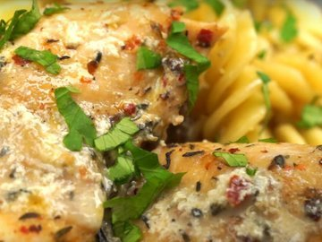 Pasta with chicken and mushrooms in a creamy sauce