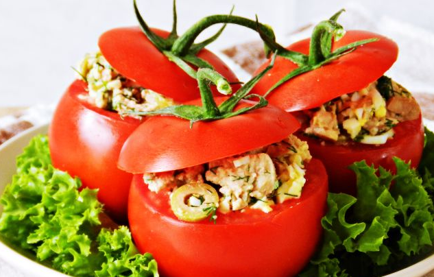 Tomatoes stuffed with cod liver salad