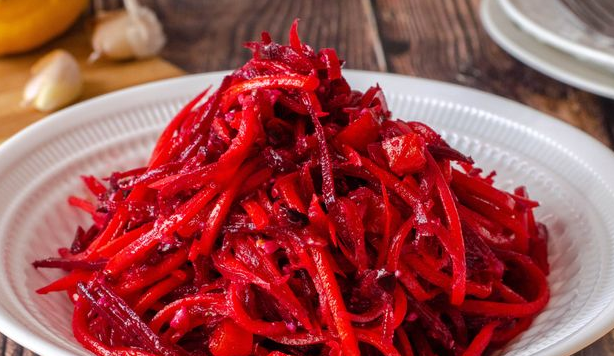 Salad of beets and carrots, with nuts and dried fruits