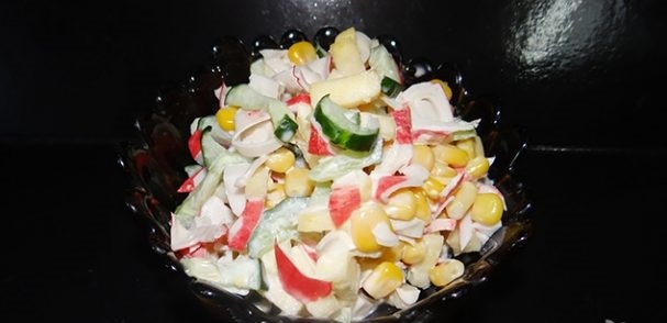 Salad with crab sticks and apple