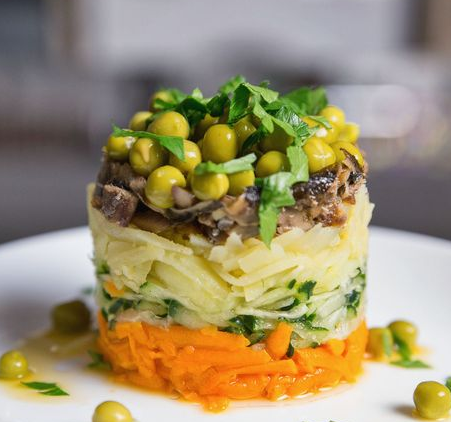 Layered salad with sprats and green peas (without mayonnaise)