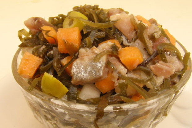Seaweed salad with herring and vegetables