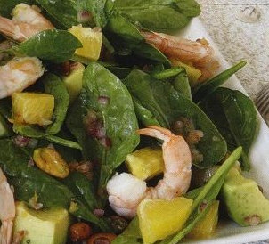 Salad with shrimp, avocado, spinach and oranges