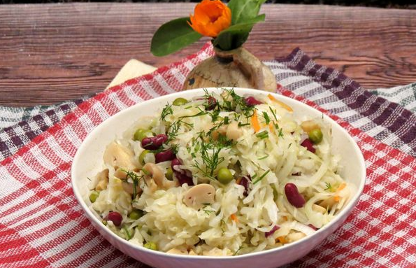 Salad with sauerkraut, beans, peas and mushrooms