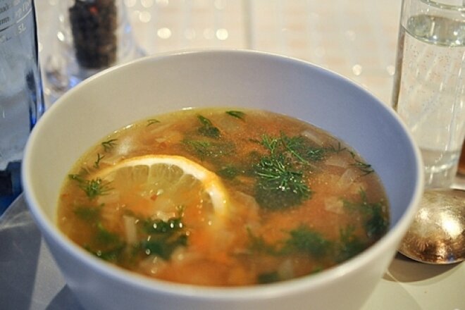 Sturgeon fish soup with tomato paste
