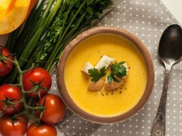 Tasty Pumpkin cream soup with cheese