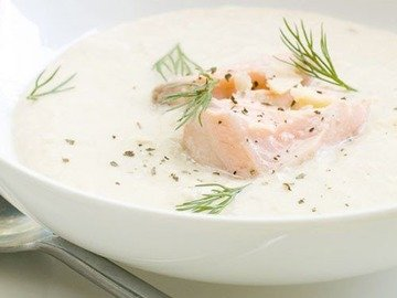 Creamy soup with salmon in a slow cooker