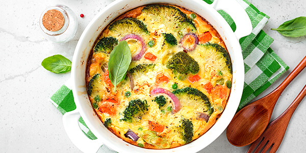 Frittata with bacon, assorted vegetables and cheddar cheese
