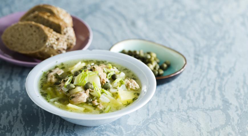 Thick potato soup with tuna and capers