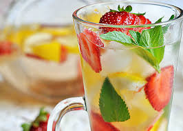 Refreshing drink with strawberries and lime