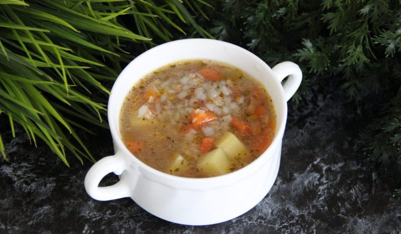 Potato soup with stewed meat and buckwheat