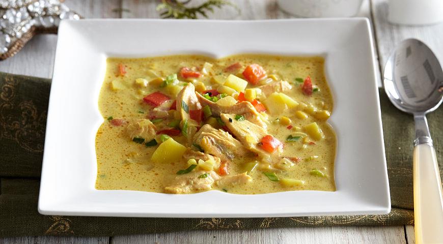 Thick creamy soup with smoked pink salmon