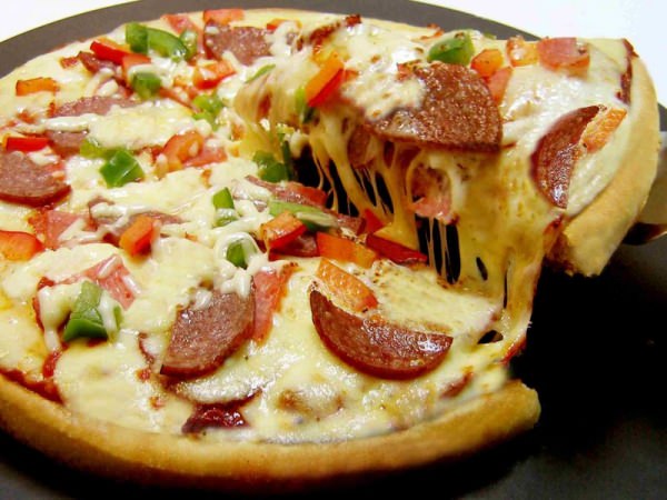pizza with sausage and cheese