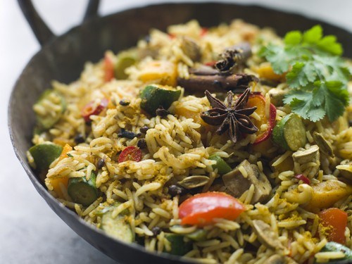 Rice with fried vegetables and mushrooms