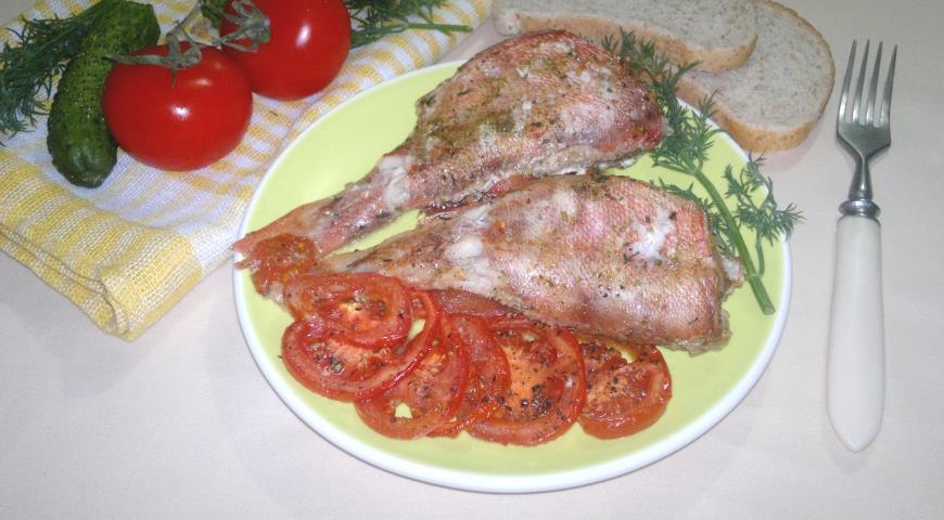 Baked sea bass with tomatoes
