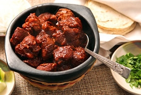 Pork goulash with tomato paste and onions