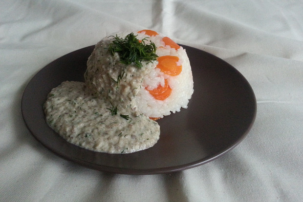 Rice with carrots with mushroom sauce