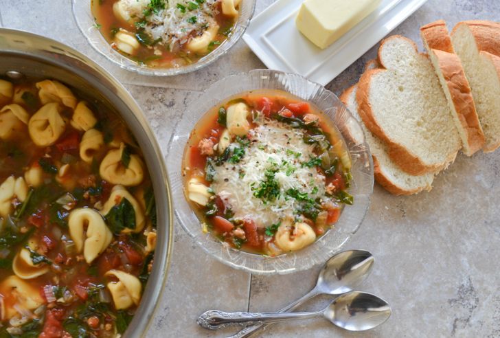 Delicious Italian tomato soup with tortellini and spinach