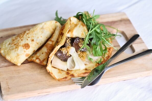 Delicious pancakes with mushrooms
