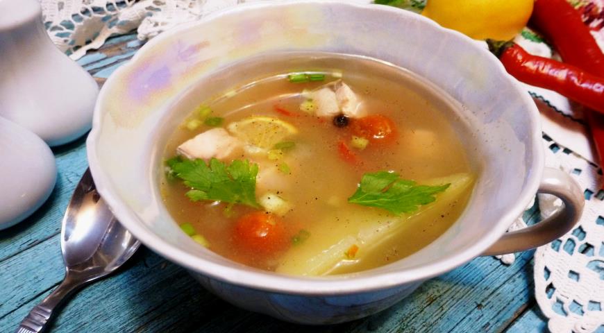 Fish soup with millet and tomatoes