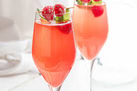 Orange-raspberry cocktail with champagne