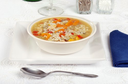 Soup with rabbit and carnaroli rice