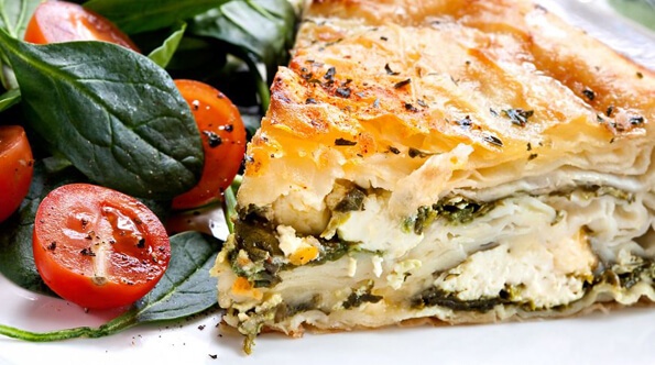 Open pie with spinach and cheese