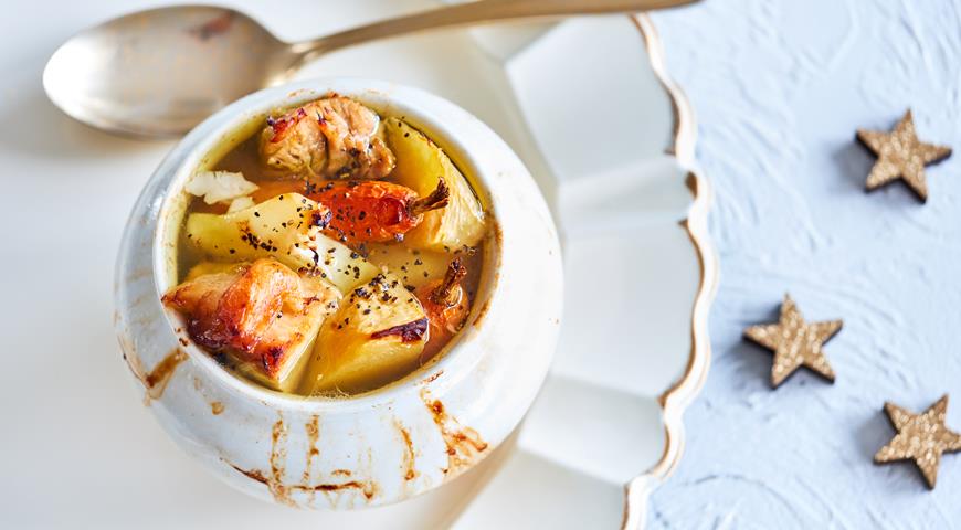 Russian chowder with ham in a pot