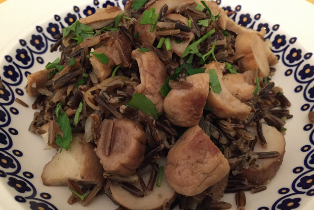 Diet risotto from wild rice with porcini mushrooms