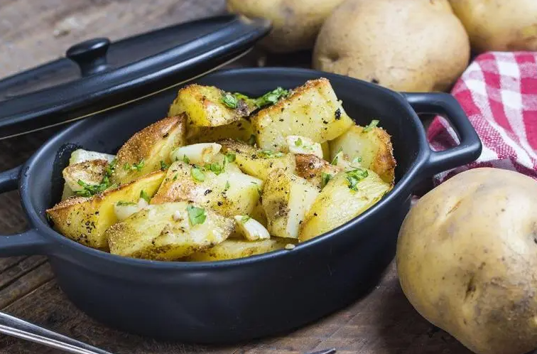 Baked potatoes in a peasant way in the oven