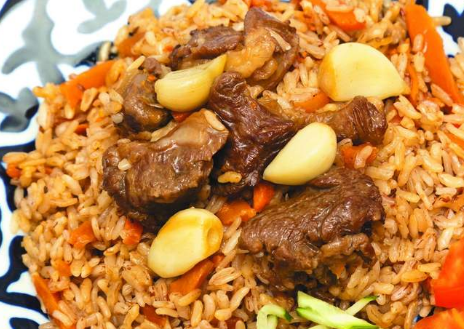 Crumbly pilaf with pork