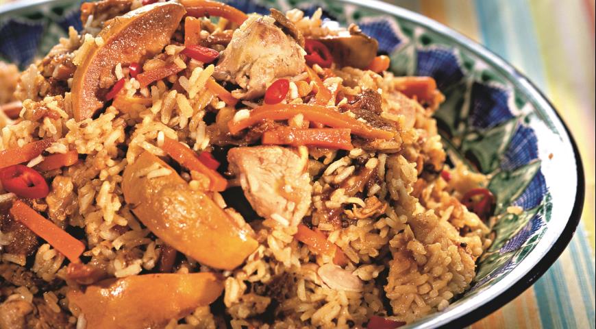 Pilaf with chicken in a saucepan
