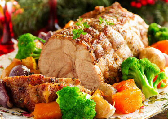 PORK baked with vegetables and thyme
