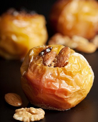 Apples baked with rice, fruits and nuts