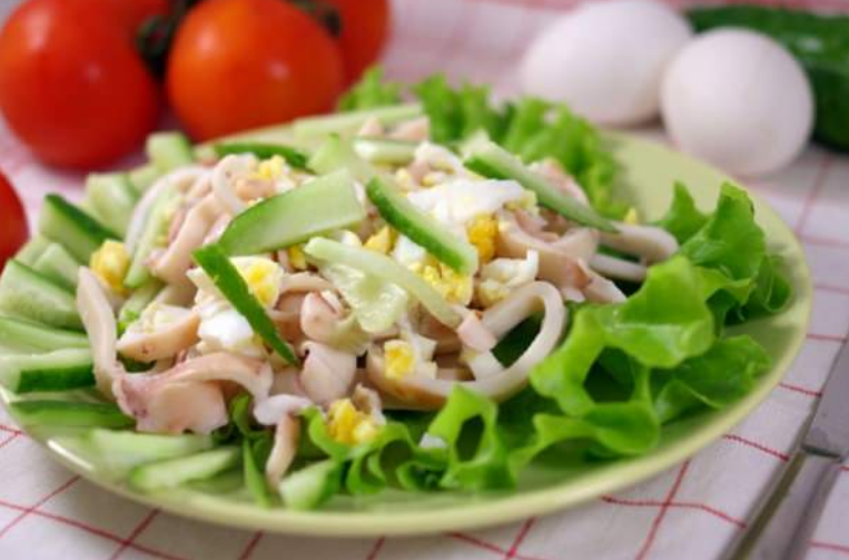 Festive salad with squid and cucumbers