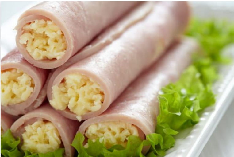 Delicious rolls with cheese and ham