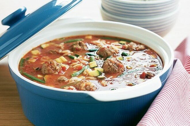 Italian-style vegetable soup with cheese, meatballs and noodles