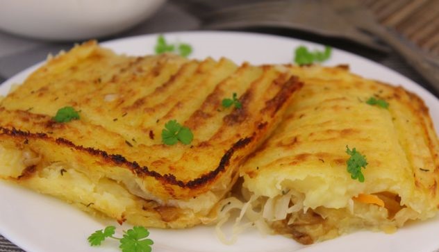 Mashed potato casserole with sauerkraut and fried onions