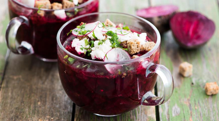 Beetroot soup with feta cheese and radish