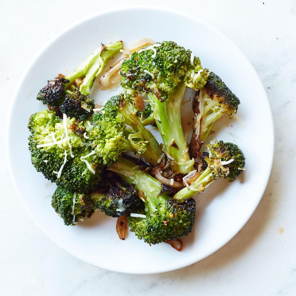 Broccoli with parmesan and balsamic vinegar in a wok