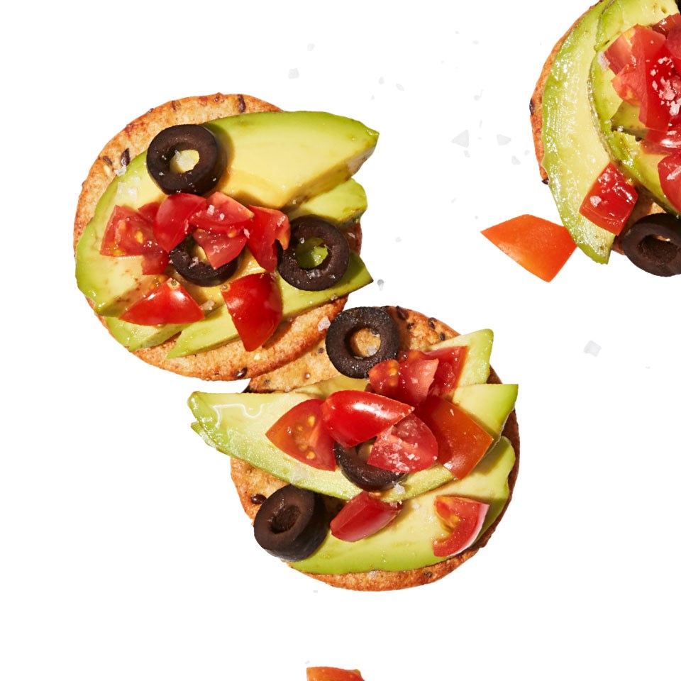 Mini toast with avocado and tomatoes