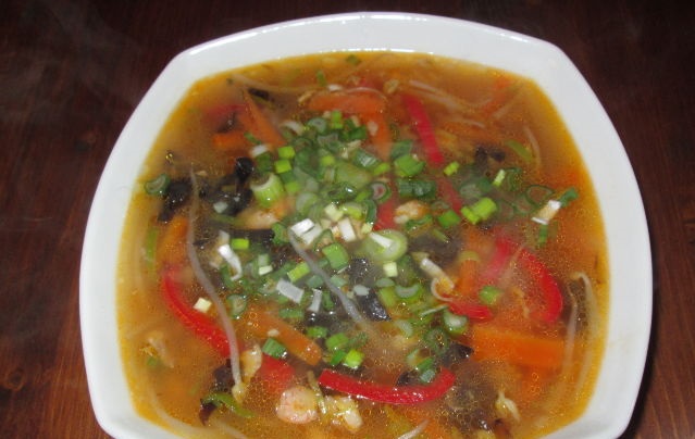 Chinese fish soup with vegetables and muer mushrooms