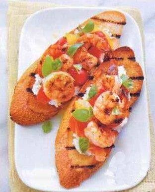 Bruschetta with grilled tomatoes and shrimps