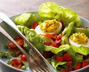 Vegetable salad with stuffed eggs