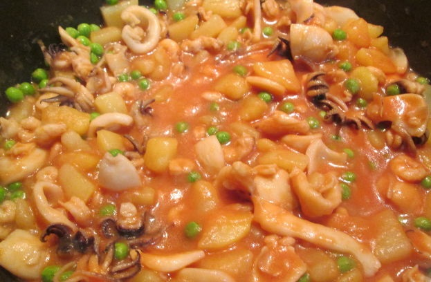 Cuttlefish and shrimps with potatoes and peas