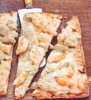 Lavash pizza with shrimps and artichokes
